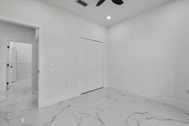 924 Berg St E, Lehigh Acres, FL 33974 - unfurnished bedroom featuring recessed lighting, marble finish floor, visible vents, and baseboards