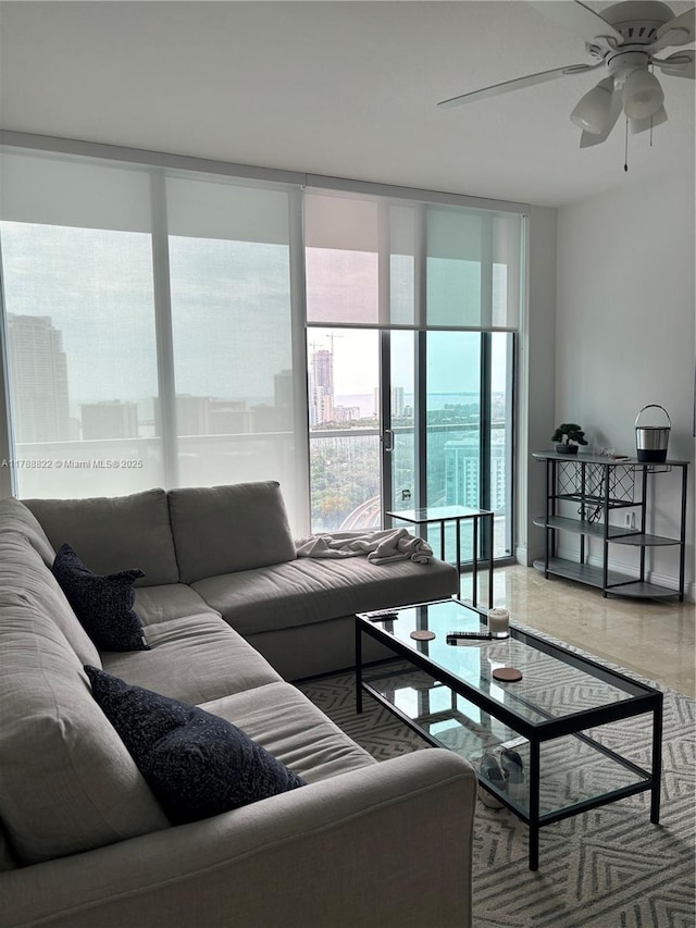 79 SW 12th St Unit 2703-S, Miami, FL 33130 - living room featuring a city view, expansive windows, and a ceiling fan