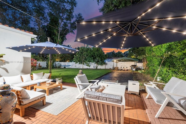 558 NE 94th St, Miami Shores, FL 33138 - view of patio featuring a fenced backyard, outdoor lounge area, and a deck