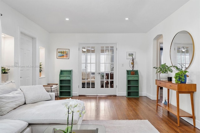 558 NE 94th St, Miami Shores, FL 33138 - living room with baseboards, a ceiling fan, wood finished floors, and recessed lighting