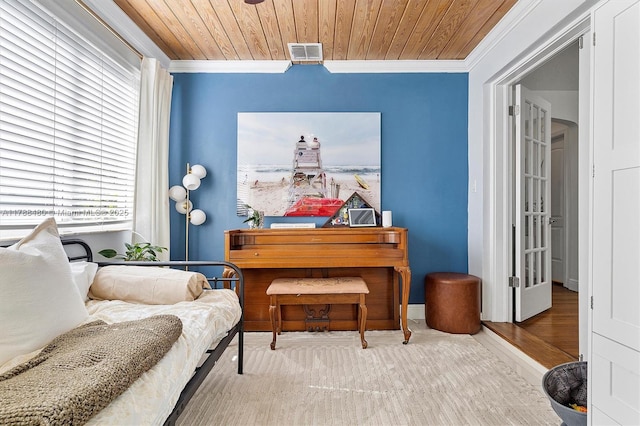 558 NE 94th St, Miami Shores, FL 33138 - sitting room featuring wood ceiling, crown molding, wood finished floors, and visible vents