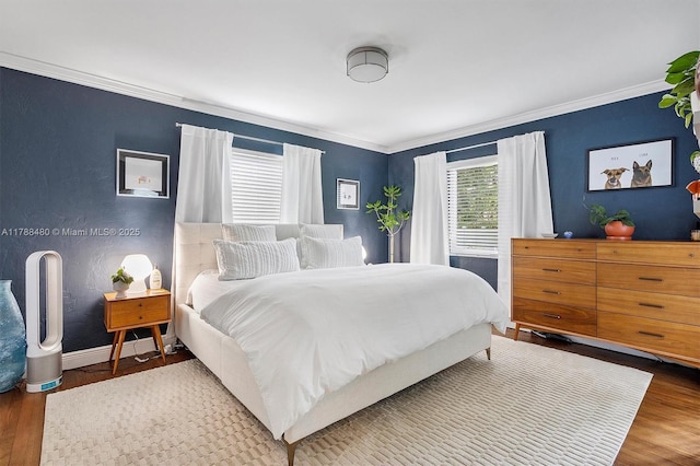 558 NE 94th St, Miami Shores, FL 33138 - bedroom featuring baseboards, ornamental molding, and wood finished floors