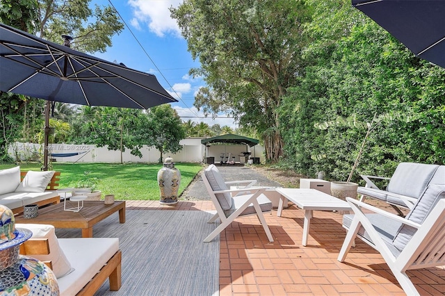 558 NE 94th St, Miami Shores, FL 33138 - view of patio / terrace with an outdoor living space, fence, and a deck