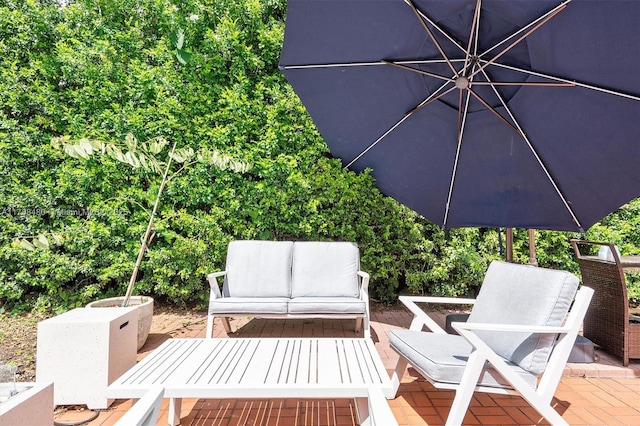 558 NE 94th St, Miami Shores, FL 33138 - view of patio featuring an outdoor living space