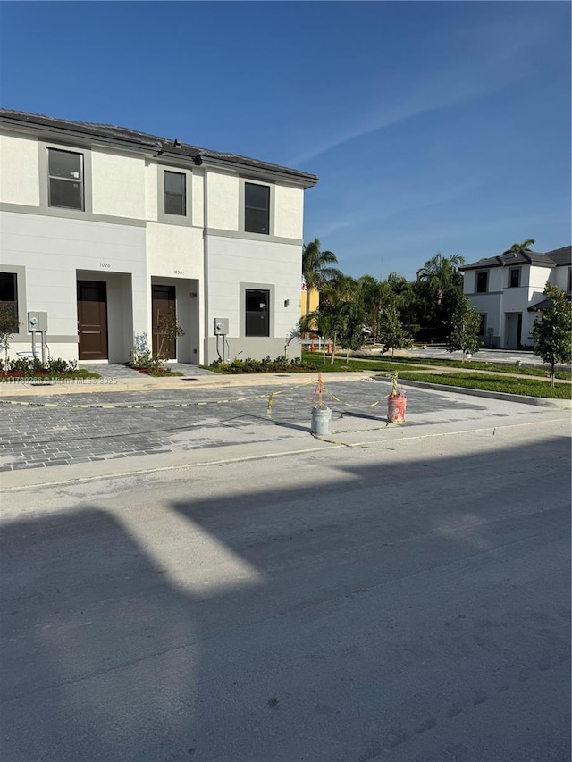 1037 NW 1st Ave Unit A, Florida City, FL 33034 - townhome / multi-family property featuring stucco siding