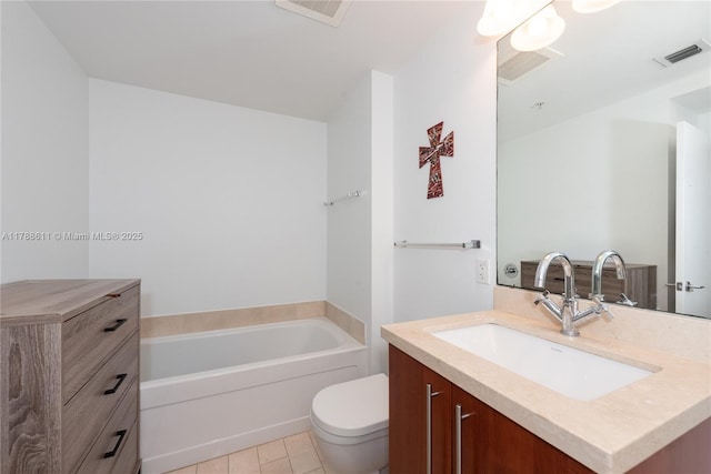 79 SW 12th St Unit 2011-S, Miami, FL 33130 - bathroom with vanity, toilet, a bath, and visible vents