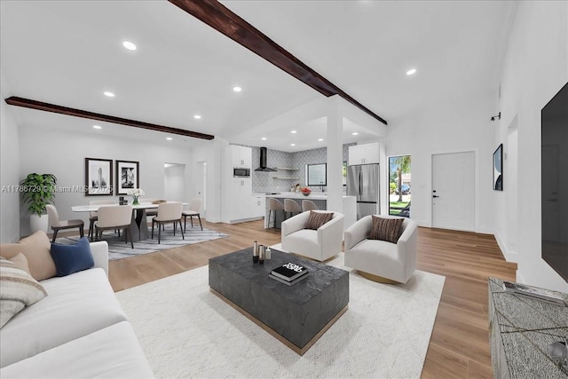 15020 NE 7th Ave, Miami, FL 33161 - living area featuring light wood finished floors and recessed lighting
