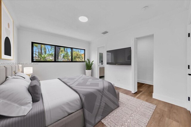 15020 NE 7th Ave, Miami, FL 33161 - bedroom with wood finished floors and baseboards