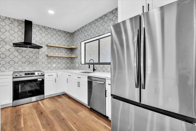 15020 NE 7th Ave, Miami, FL 33161 - kitchen featuring wall chimney exhaust hood, stainless steel appliances, a sink, light wood-type flooring, and open shelves