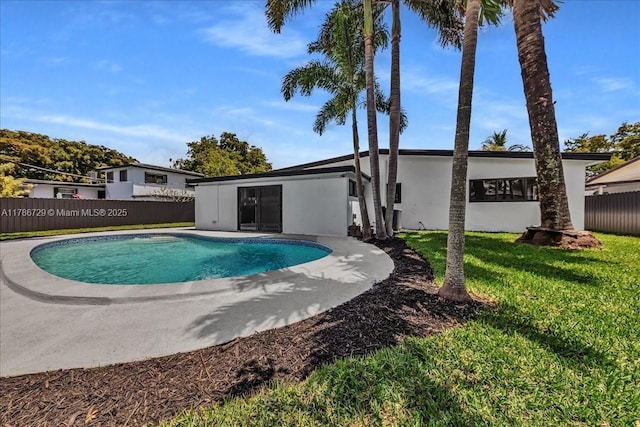 15020 NE 7th Ave, Miami, FL 33161 - view of pool featuring a yard, a fenced in pool, and fence