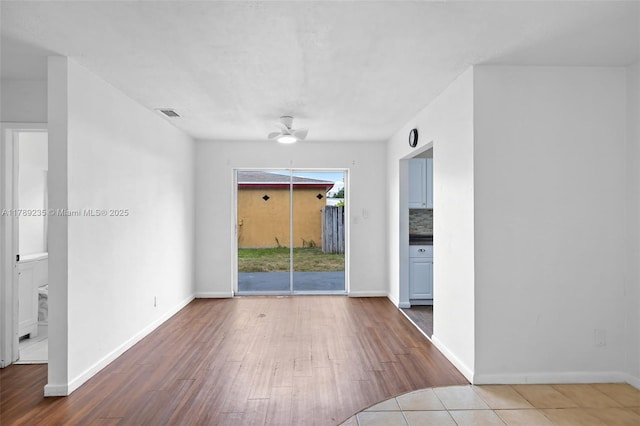 1920 N 66th Ave, Hollywood, FL 33024 - unfurnished room with baseboards, a ceiling fan, wood finished floors, and visible vents