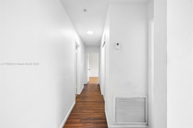 1920 N 66th Ave, Hollywood, FL 33024 - hall featuring visible vents, baseboards, and dark wood-style floors