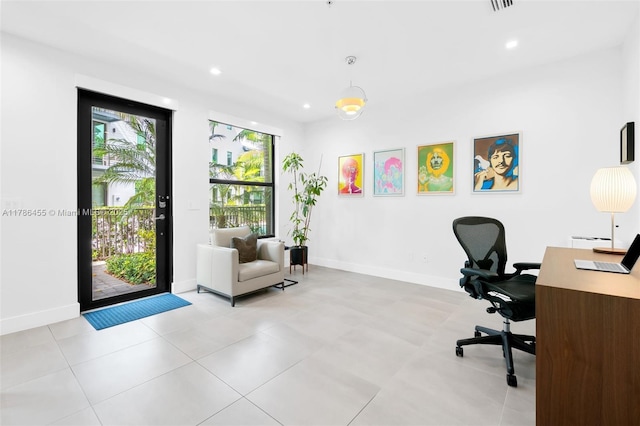 office featuring baseboards and recessed lighting
