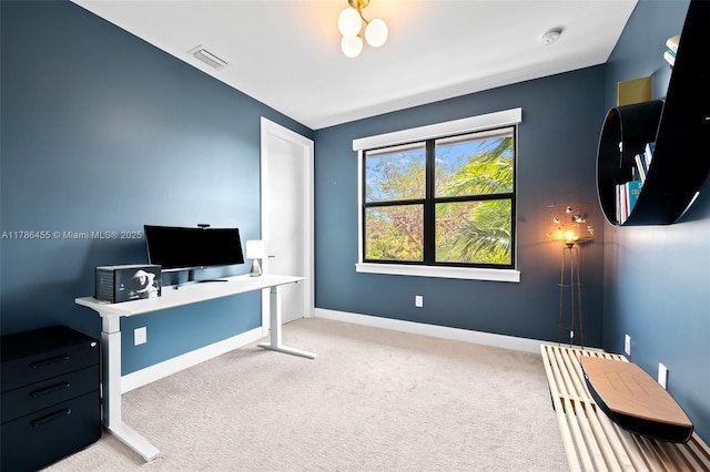 home office with baseboards, carpet flooring, and visible vents