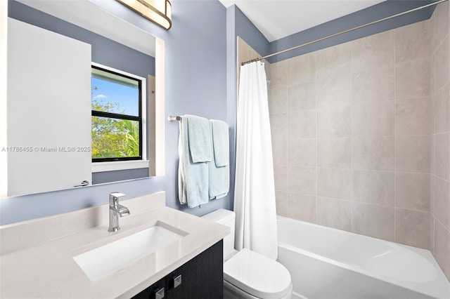 full bathroom with shower / bath combo, vanity, and toilet
