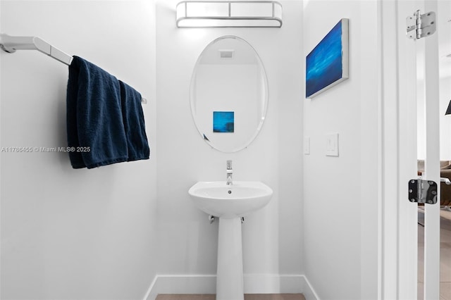 bathroom with baseboards