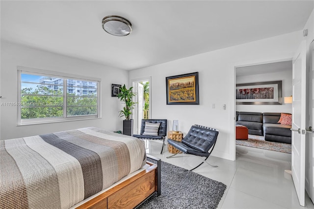 1120 99th St Unit 302, Bay Harbor Islands, FL 33154 - tiled bedroom featuring access to outside and baseboards