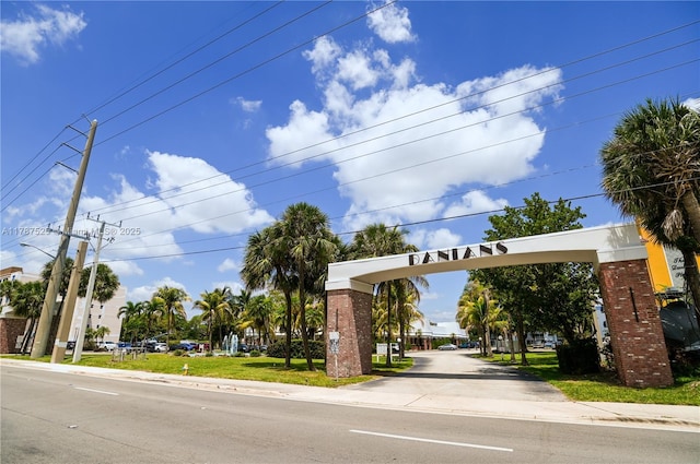 view of road featuring sidewalks and street lighting