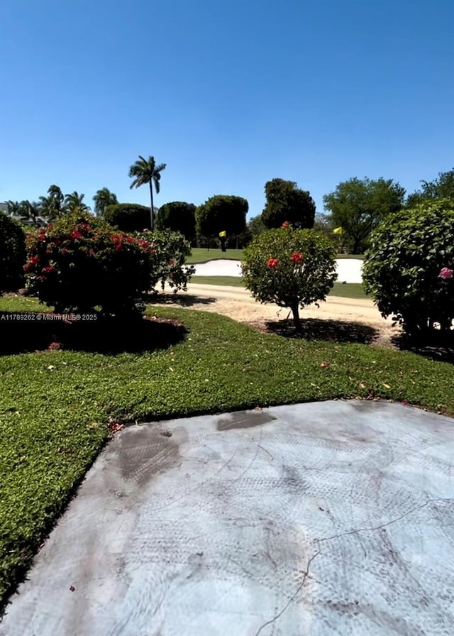 exterior space with a yard and a patio area