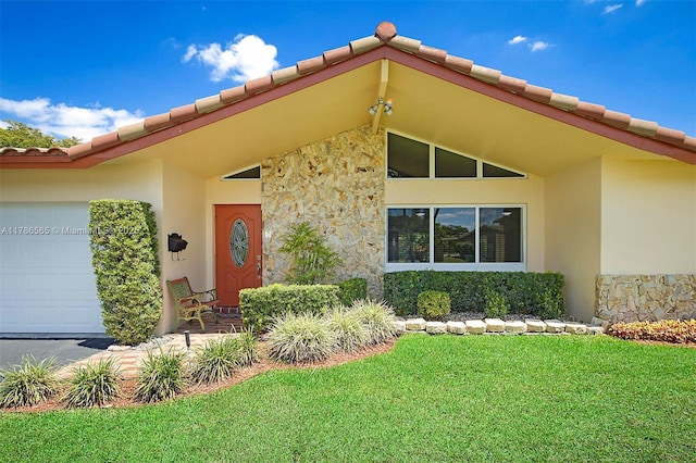3971 NW 108th Dr, Coral Springs, FL 33065 - property entrance featuring a tiled roof, stucco siding, stone siding, a lawn, and a garage