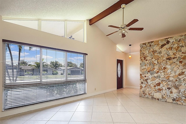 3971 NW 108th Dr, Coral Springs, FL 33065 - foyer entrance with light tile patterned floors, beamed ceiling, a textured ceiling, high vaulted ceiling, and ceiling fan