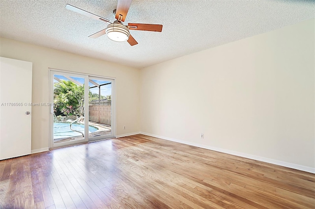 3971 NW 108th Dr, Coral Springs, FL 33065 - empty room featuring wood finished floors, a textured ceiling, a ceiling fan, and baseboards
