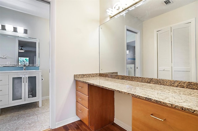 3971 NW 108th Dr, Coral Springs, FL 33065 - full bathroom featuring vanity, a ceiling fan, baseboards, and visible vents