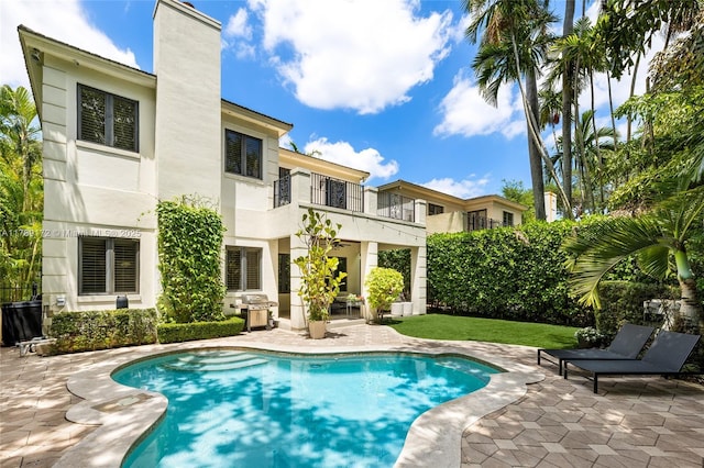 1672 Micanopy Ave, Miami, FL 33133 - swimming pool featuring a patio area and area for grilling