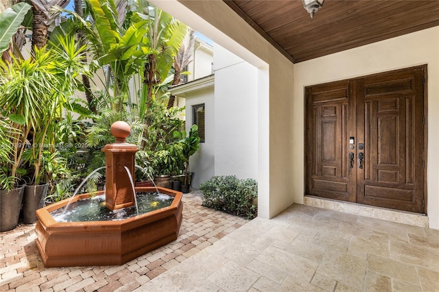 1672 Micanopy Ave, Miami, FL 33133 - property entrance featuring stucco siding
