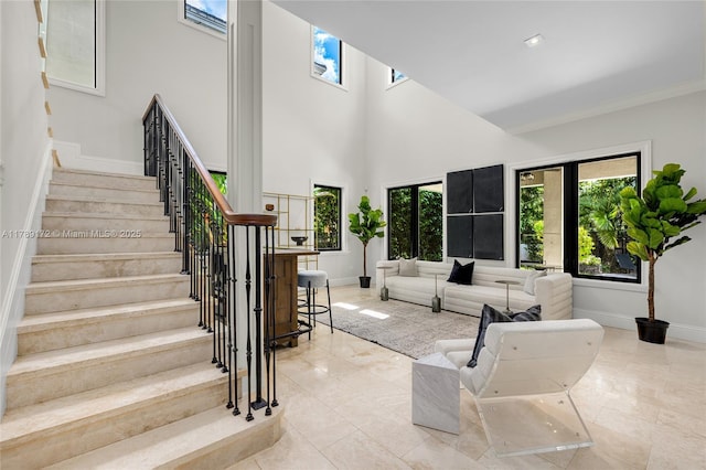 1672 Micanopy Ave, Miami, FL 33133 - living room with stairs and a towering ceiling