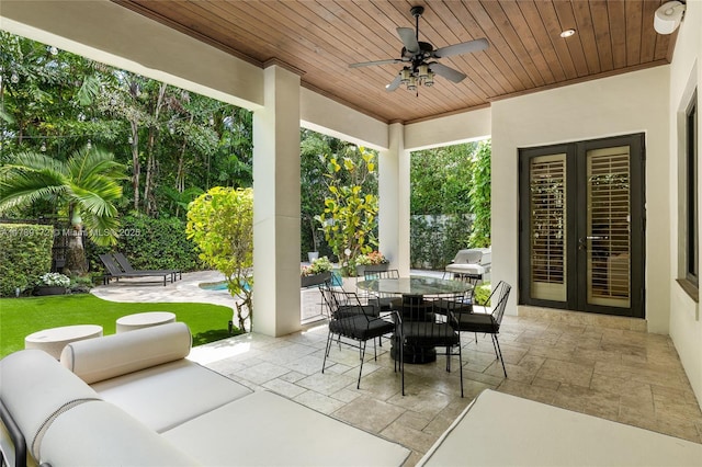1672 Micanopy Ave, Miami, FL 33133 - view of patio with outdoor dining space, ceiling fan, french doors, an outdoor pool, and an outdoor hangout area