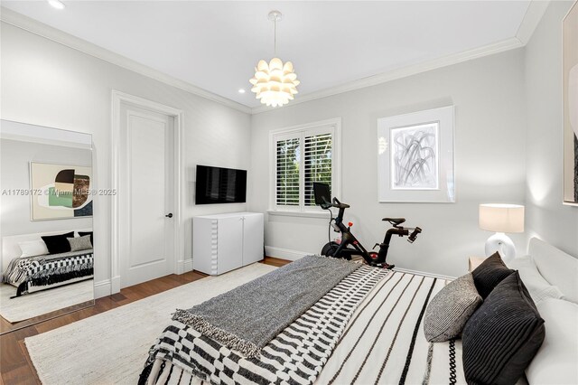 1672 Micanopy Ave, Miami, FL 33133 - bedroom with wood finished floors, ornamental molding, recessed lighting, and a chandelier