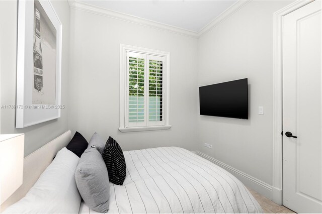 1672 Micanopy Ave, Miami, FL 33133 - bedroom featuring ornamental molding and baseboards