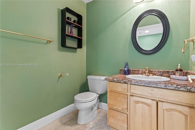 8350 SW 98 Th St, Miami, FL 33156 - half bathroom featuring vanity, toilet, and baseboards