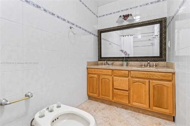 8350 SW 98 Th St, Miami, FL 33156 - bathroom with a bidet, double vanity, tile walls, and a sink
