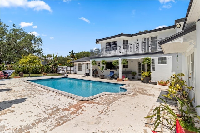 8350 SW 98 Th St, Miami, FL 33156 - outdoor pool featuring a patio and french doors