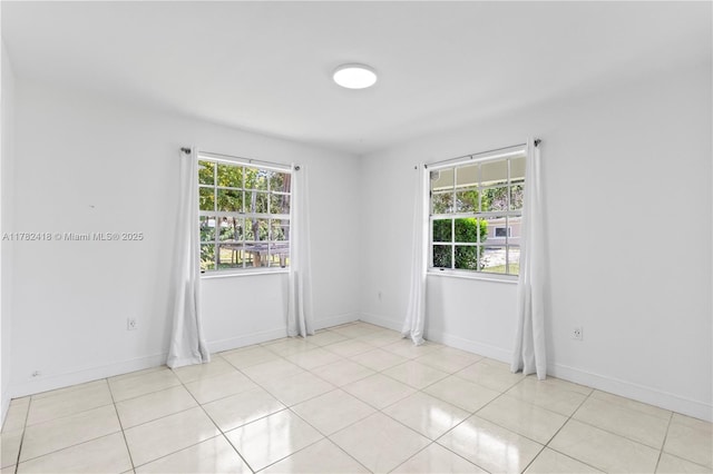 8350 SW 98 Th St, Miami, FL 33156 - empty room with baseboards and light tile patterned flooring