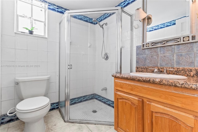 8350 SW 98 Th St, Miami, FL 33156 - bathroom featuring a shower stall, vanity, and tile walls