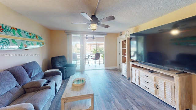 9681 Sunrise Lakes Blvd Unit 209, Sunrise, FL 33322 - living room featuring baseboards, a ceiling fan, wood finished floors, and a textured ceiling