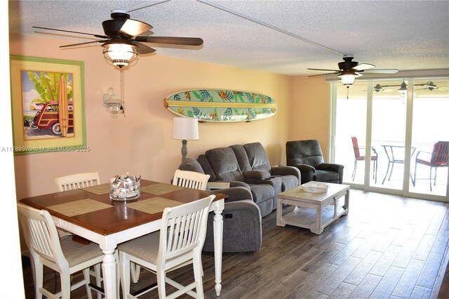 9681 Sunrise Lakes Blvd Unit 209, Sunrise, FL 33322 - dining space with a ceiling fan, a textured ceiling, and dark wood finished floors