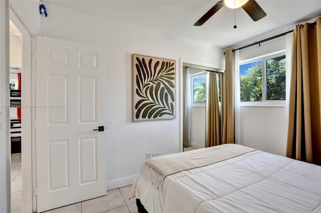 3411 SW 36th St, West Park, FL 33023 - bedroom featuring light tile patterned floors and a ceiling fan