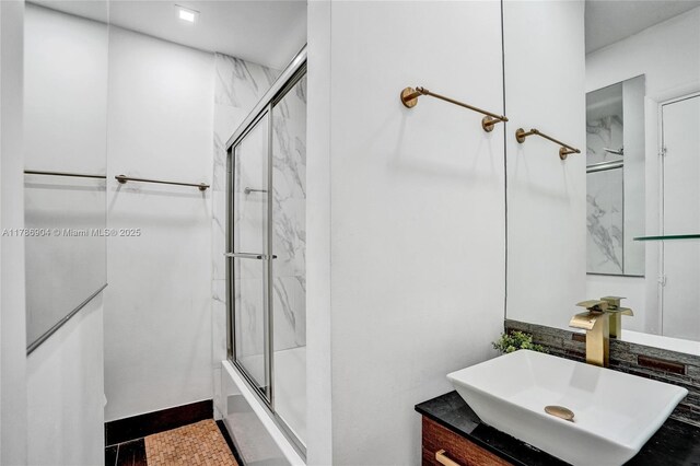 3411 SW 36th St, West Park, FL 33023 - bathroom featuring bath / shower combo with glass door and vanity