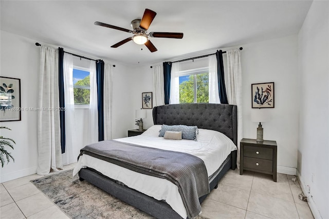 3411 SW 36th St, West Park, FL 33023 - bedroom with multiple windows, light tile patterned floors, and ceiling fan