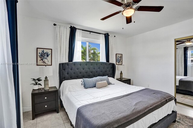 3411 SW 36th St, West Park, FL 33023 - bedroom with multiple windows, light tile patterned flooring, and a ceiling fan