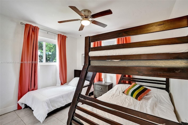 3411 SW 36th St, West Park, FL 33023 - tiled bedroom featuring baseboards and ceiling fan