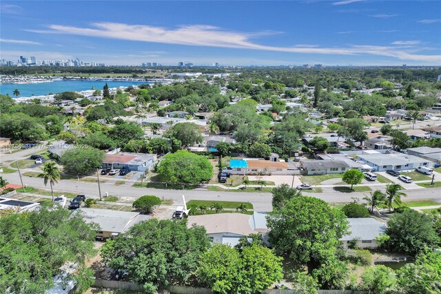 3411 SW 36th St, West Park, FL 33023 - aerial view of residential area with a large body of water and city skyline