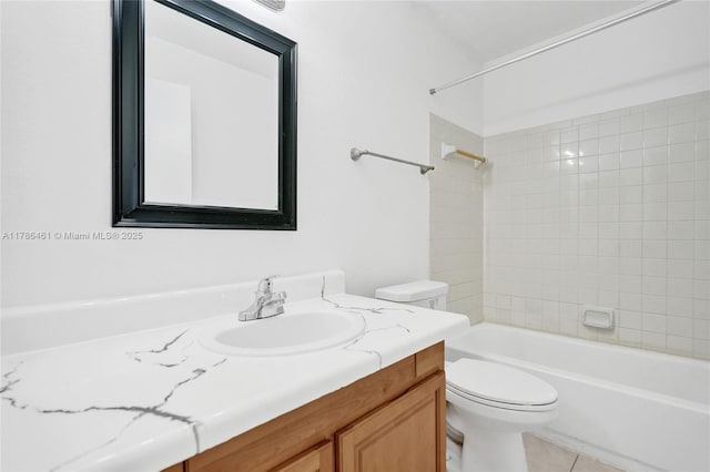 bathroom featuring toilet, tile patterned floors, washtub / shower combination, and vanity