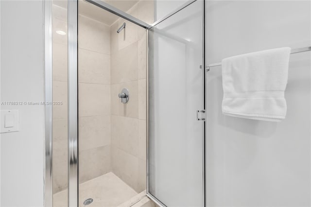 bathroom with a stall shower