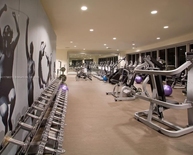 gym featuring recessed lighting