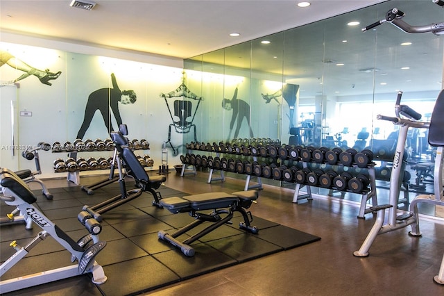 gym with recessed lighting and visible vents